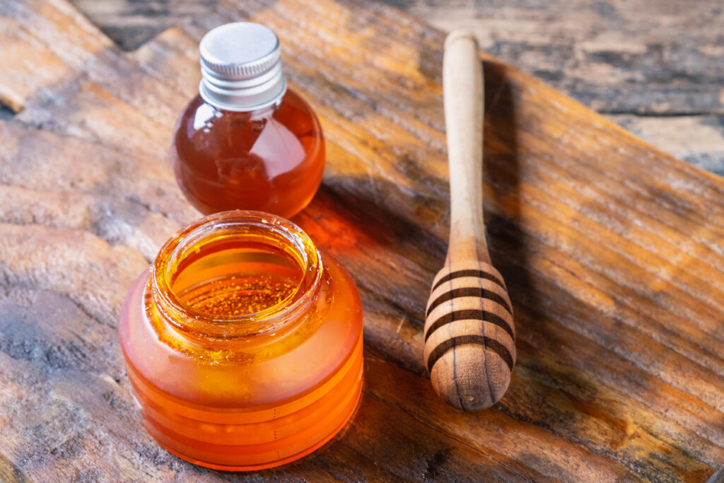 vecteezy organic honey on wooden table 1741139